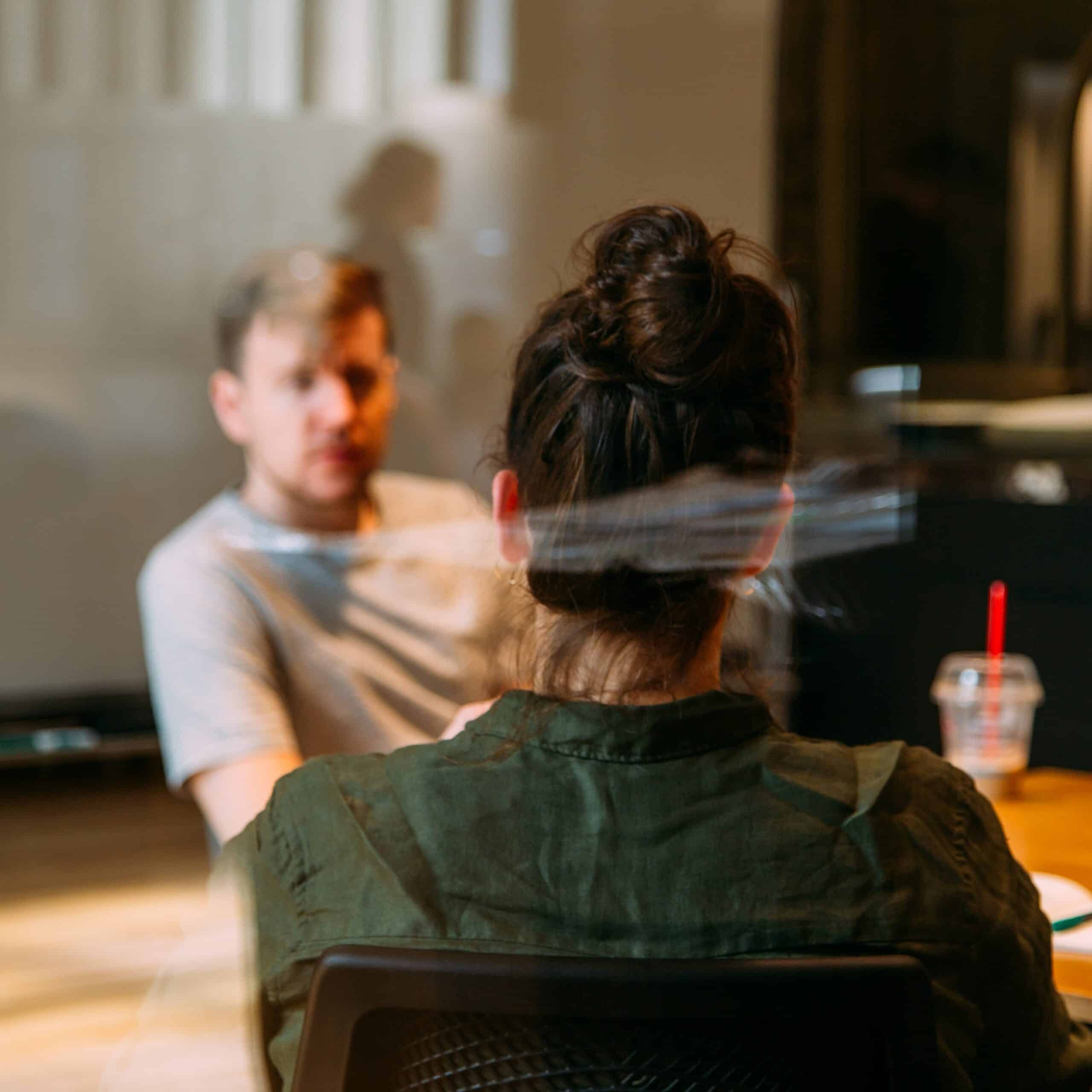 a manager talks to a member of their team about mental health.