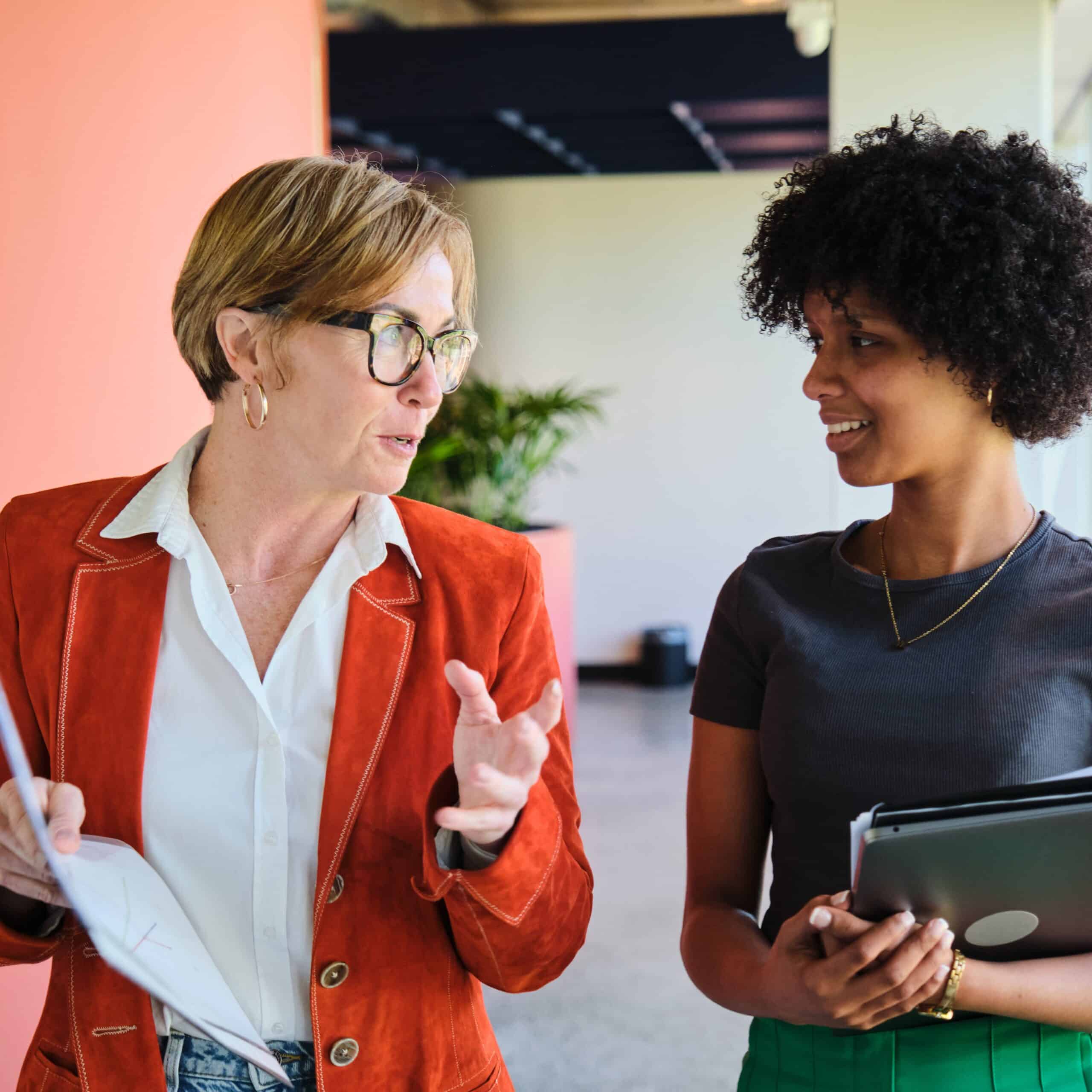 an engaged manager speaks to a member of their team